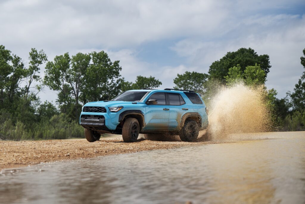 2026 Toyota 4Runner TRD Pro driving through water on a gravel trail