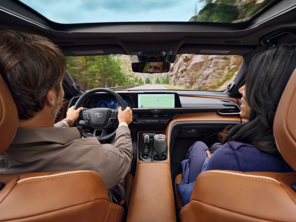 couple driving the 2026 Toyota Crown Signia