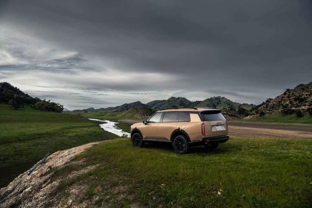 2027 Kia Telluride X-Pro front exterior showing rugged grille, amber lighting, and off-road styling