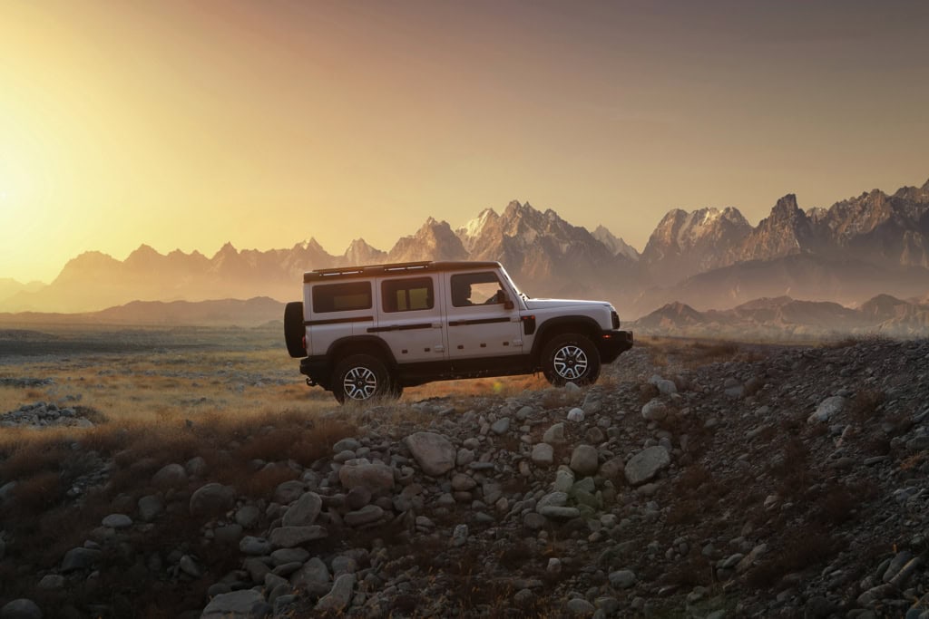 Ineos Grenadier 4x4 SUV showing rugged front design, exposed hardware, and off-road stance