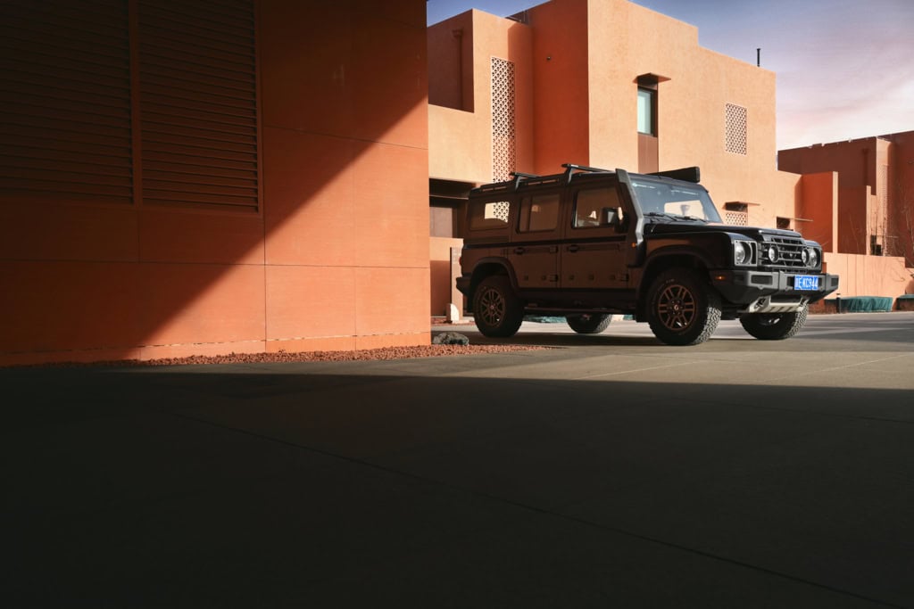 Ineos Grenadier 4x4 SUV showing rugged front design, exposed hardware, and off-road stance