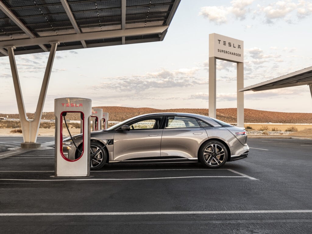 2026 Lucid being charged at a Tesla charging station with NACS