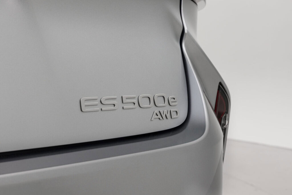 Badge view of the 2026 Lexus ES 500 E all-wheel-drive