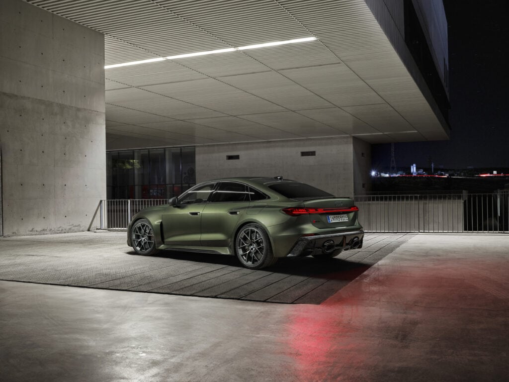 2027 Audi RS 5 Sedan in a parking garage under lights.