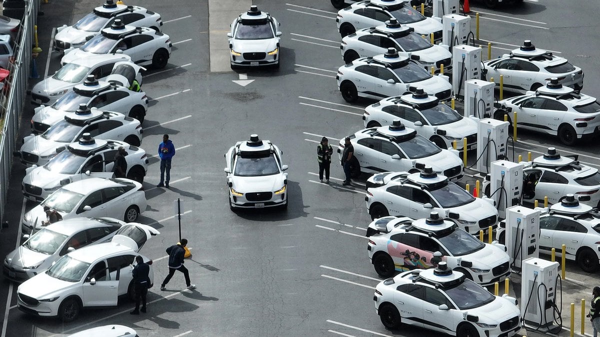Featured image for “Robotaxis in 2026: Are We Ready for Driverless Cities?”