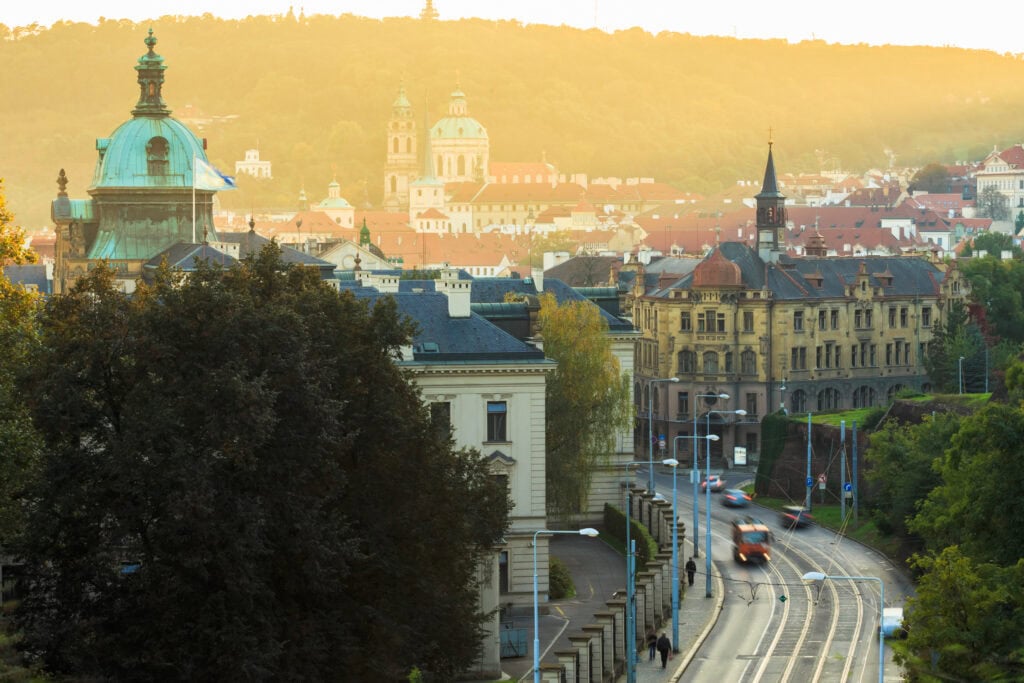 Aerial view of cityscape of Prague, Czech Republic. In left part of the photo we can see the blue dome of the Straka Academy. The Straka Academy is the seat of the Government of the Czech Republic.
