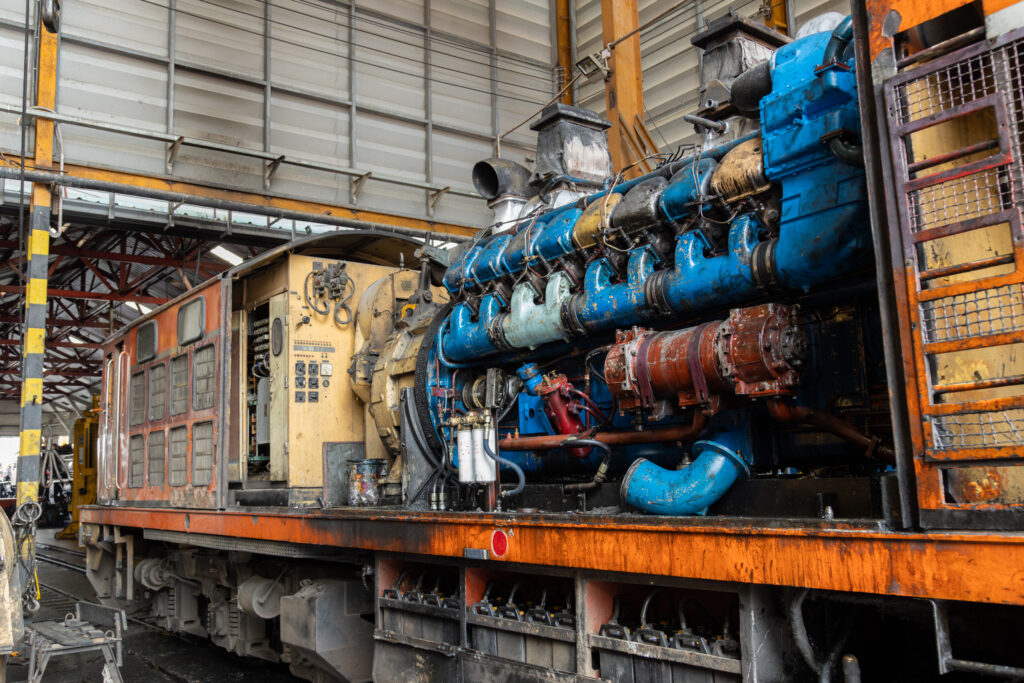 the train's diesel engine, railway track in depot of train